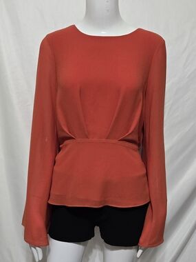 NAKED ZEBRA Burnt Orange Pleated Peplum Blouse | Long Sleeve